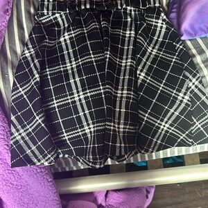 Black skirt with white stripes